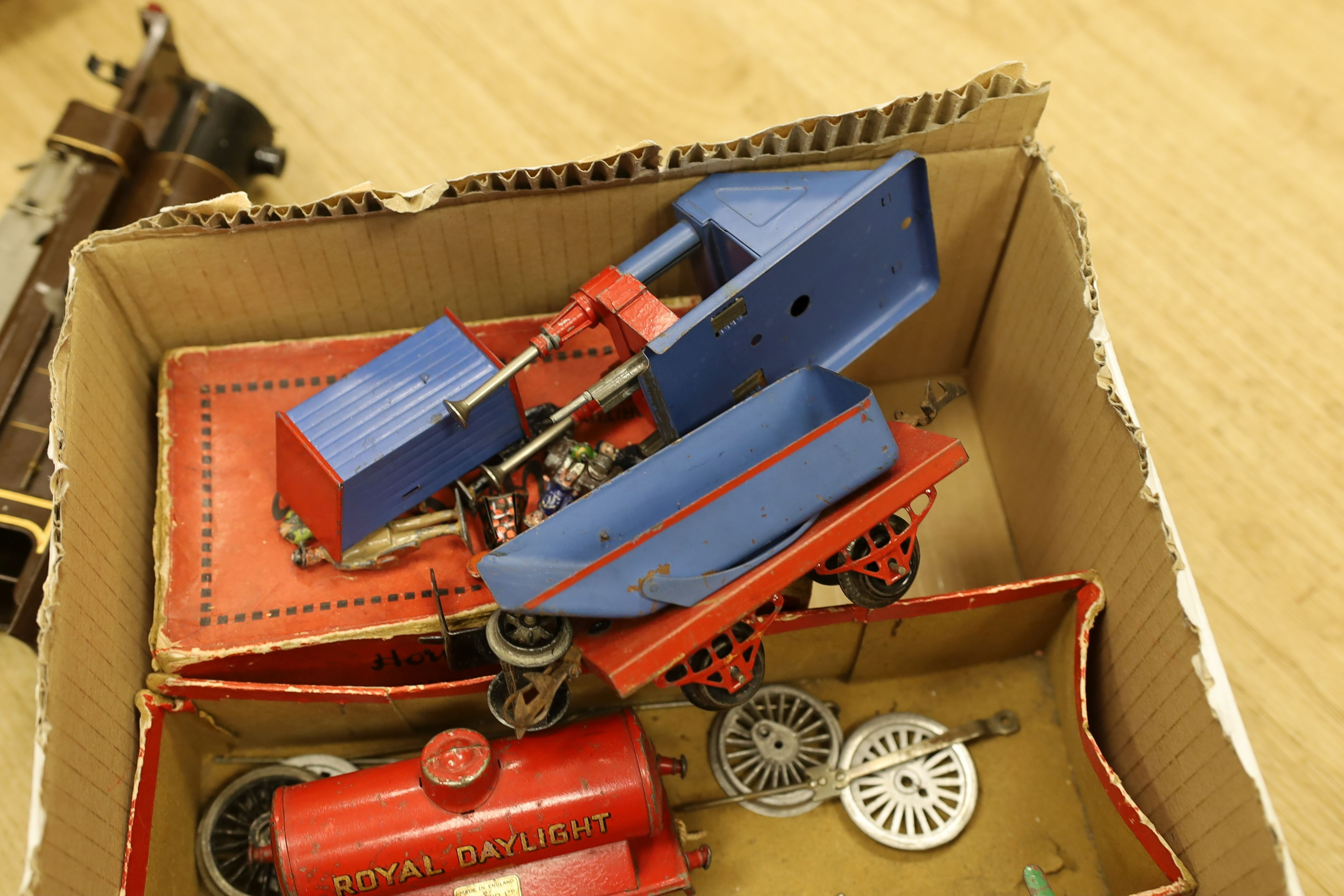 A mixed quantity of Hornby model railway track, a metal crossing, an engine and other items